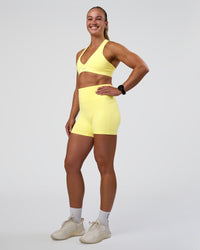 Woman wearing Stamina Rise Sports Bra - Yellow Fizz | Model:Sav | Size:S
