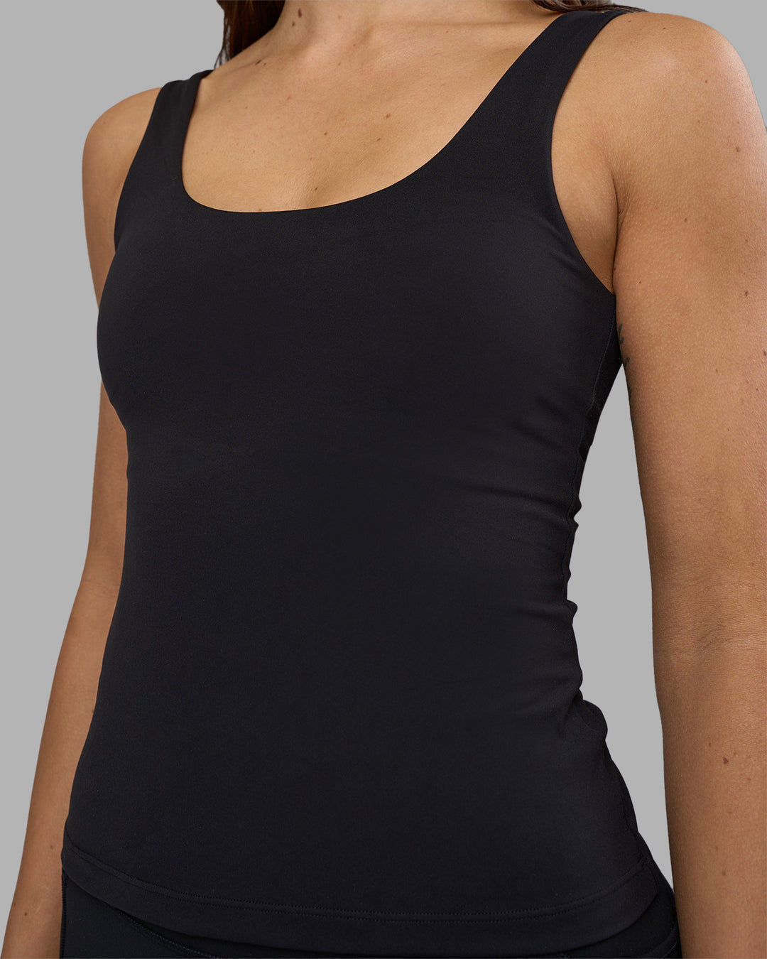 Woman wearing Staple Active Shelf Bra Tank - Black | Model:Phoebe | Size:S