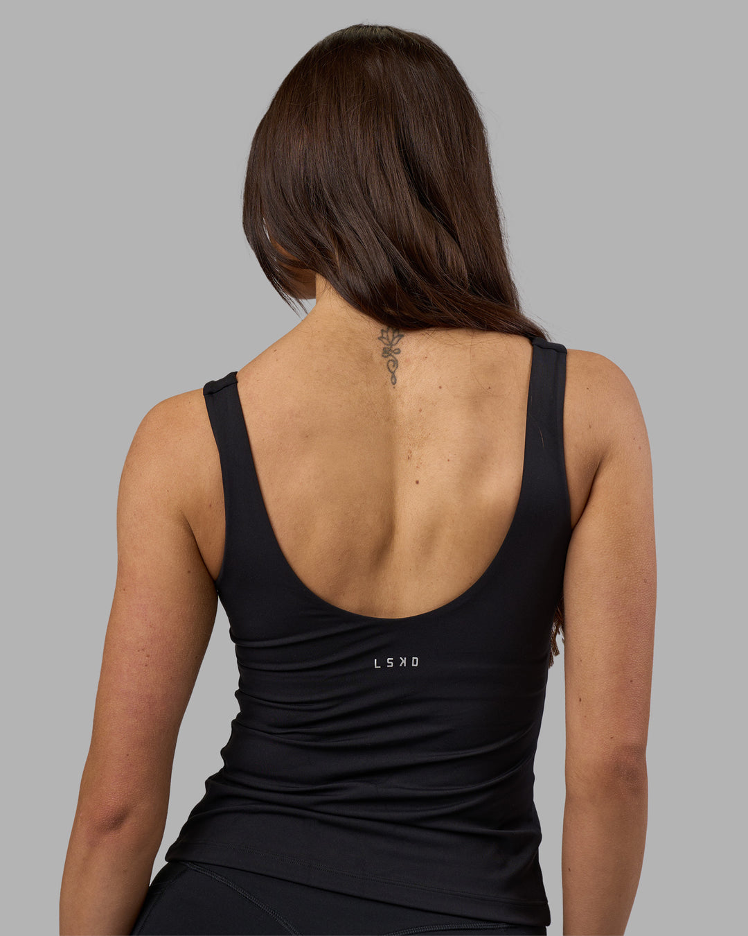 Woman wearing Staple Active Shelf Bra Tank - Black | Model:Phoebe | Size:S