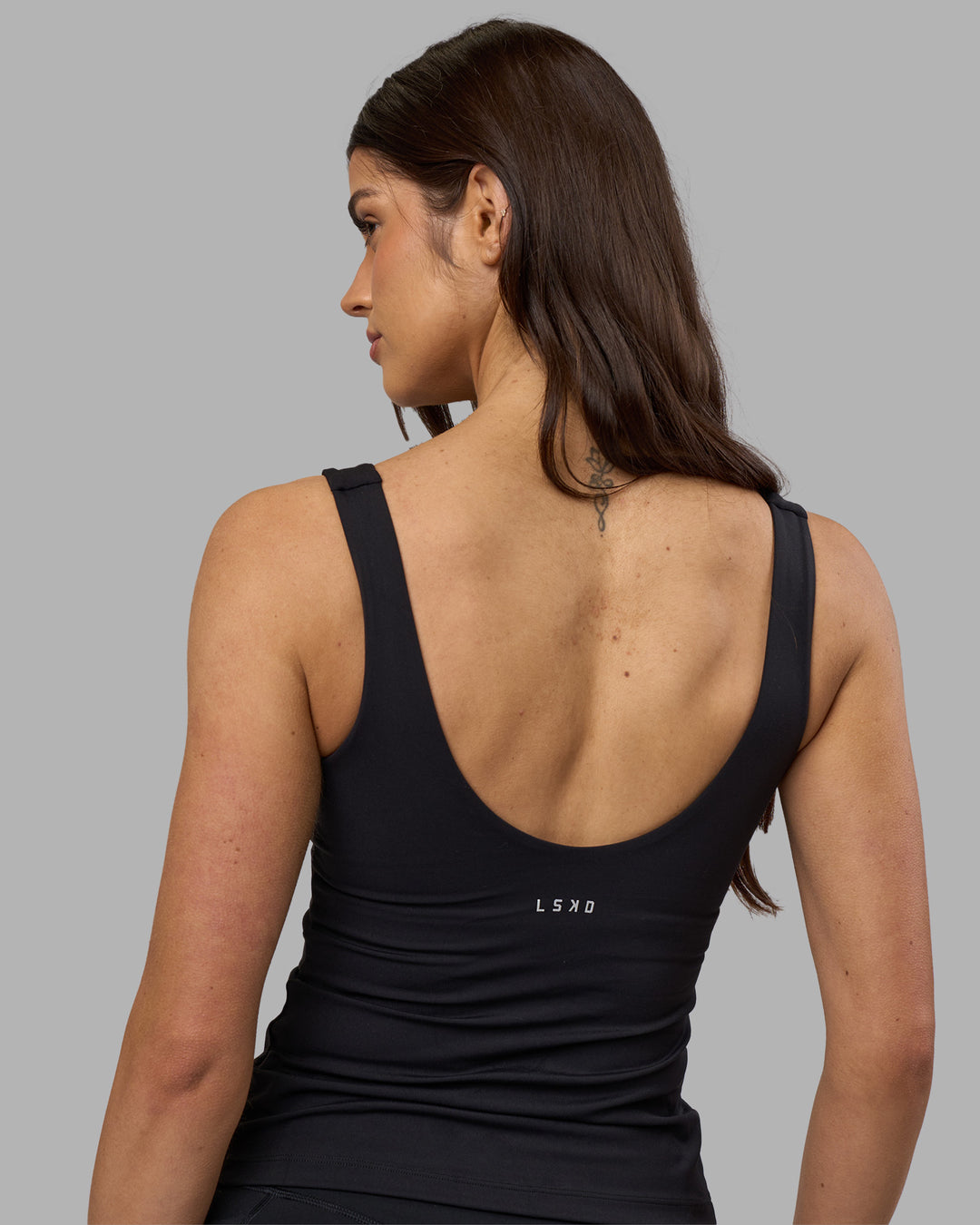 Woman wearing Staple Active Shelf Bra Tank - Black | Model:Phoebe | Size:S
