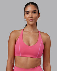Woman wearing Stellar Sports Bra - Hot Pink | Model:Rhiley | Size:S