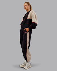 Woman wearing Stitch Up Fleece Sweat Pant - Black/Shale Beige | Model:Ella | Size:S