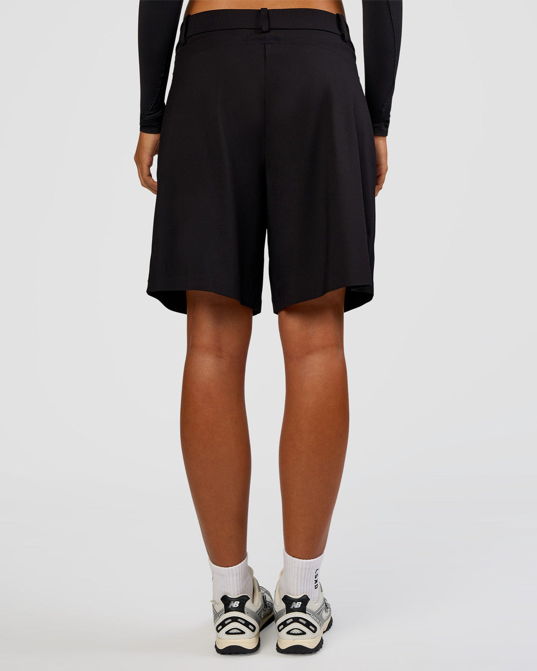 Woman wearing StretchShift Wide Leg Short - Black | Model:Ruby | Size:S