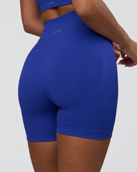 Woman wearing Surge Seamless High-Rise 6" Short - Power Cobalt | Model:Bianca | Size:S