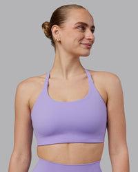 Woman wearing Twist Sports Bra D/DD/E - Violet Ray | Model:Lillie | Size:S