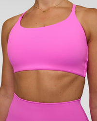 Woman wearing Twist Sports Bra - Ultra Fuchsia | Model:Myrte | Size:S | Thumbnail Index: 3