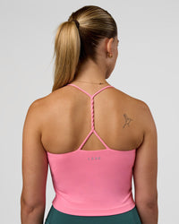 Woman wearing Twister Shelf Bra Tank - Candy Pink | Model:Myrte | Size:S
