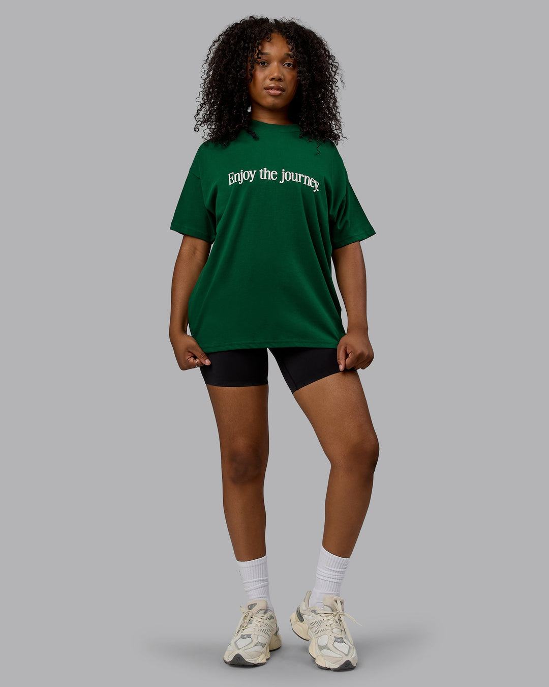 Woman wearing Unisex Enjoy The Journey Heavyweight Tee Oversize - Deep Emerald-Off-White