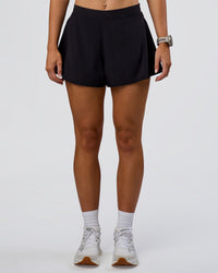 Woman wearing Unstoppable Lined Short - Black | Model:Emelia | Size:S