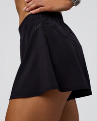 Woman wearing Unstoppable Lined Short - Black | Model:Emelia | Size:S