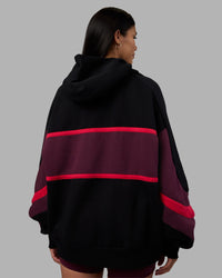 Woman wearing Vibe Oversized Unisex Hoodie - Black-Cherry Lacquer | Model:Rhiley | Size:S | Thumbnail Index: 10