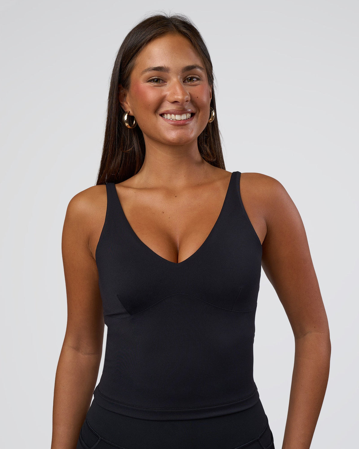 Woman wearing Vitality Active Tank - Black | Model:Bianca | Size:S - view 1