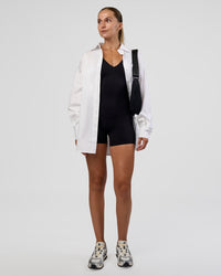 Woman wearing Vitality Bodysuit - Black | Model:Myrte | Size:S