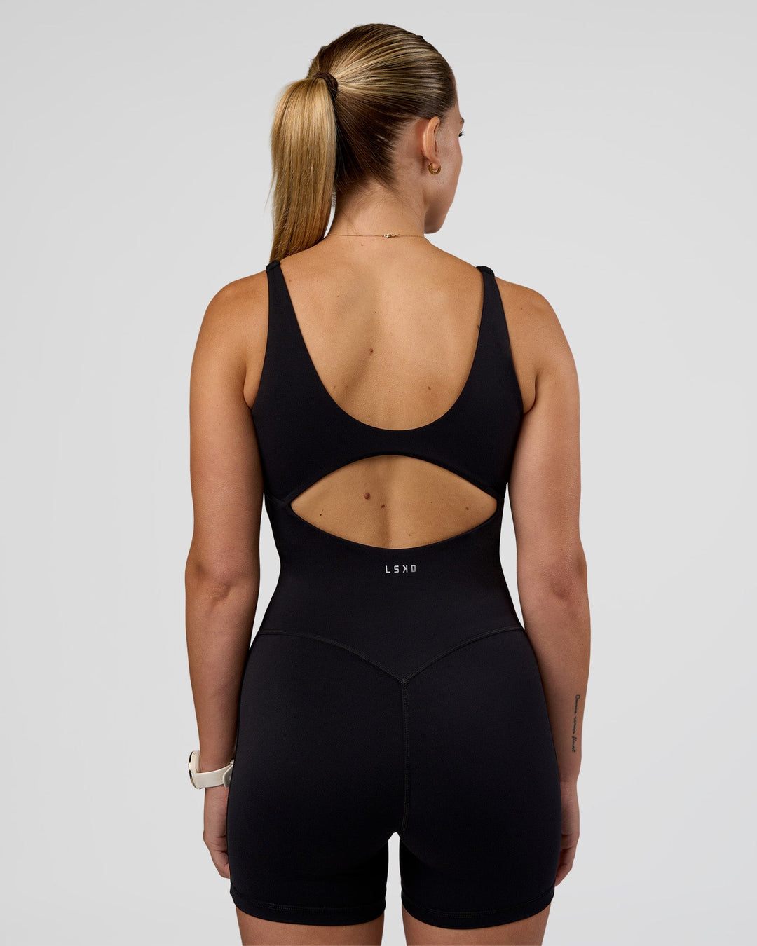 Woman wearing Vitality Bodysuit - Black | Model:Myrte | Size:S