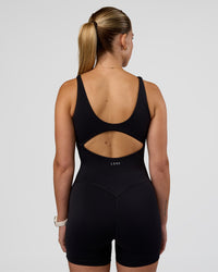 Woman wearing Vitality Bodysuit - Black | Model:Myrte | Size:S