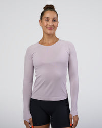 Woman wearing AeroFLX+ Seamless Long Sleeve Tee - Fair Orchid/Fair Orchid | Model:Abbey | Size:S