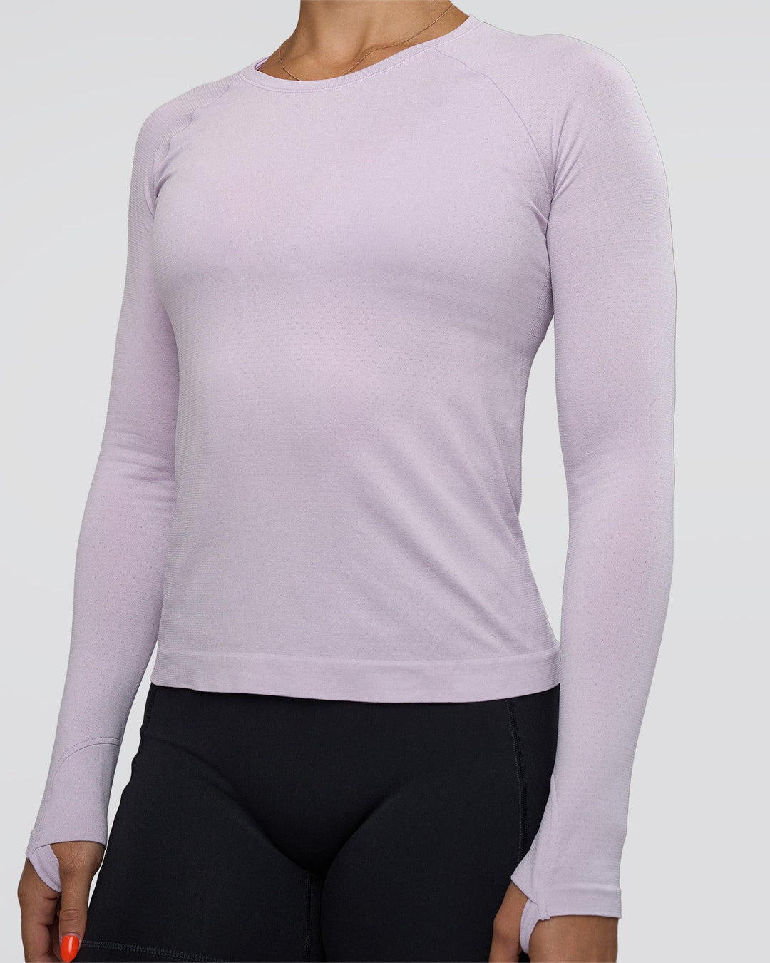 Woman wearing AeroFLX+ Seamless Long Sleeve Tee - Fair Orchid/Fair Orchid | Model:Abbey | Size:S