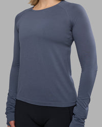 Woman wearing AeroFLX+ Seamless Long Sleeve Tee - Night Shadow/Night Shadow | Model:Halle | Size:S