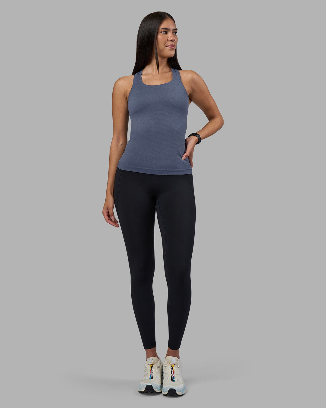 Woman wearing AeroFLX+ Seamless Tank - Night Shadow/Night Shadow | Model:Rhiley | Size:S