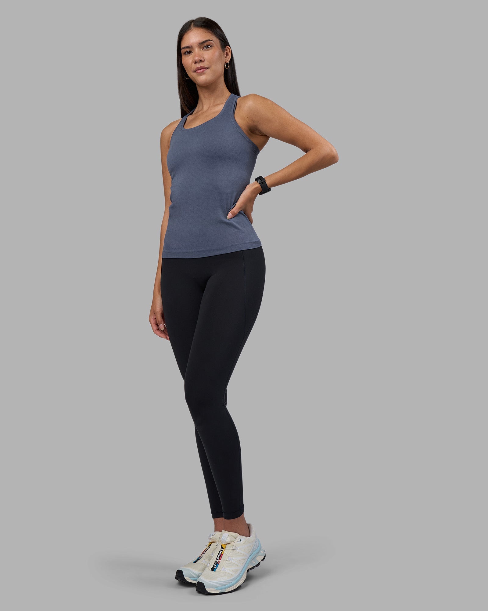 Woman wearing AeroFLX+ Seamless Tank - Night Shadow/Night Shadow | Model:Rhiley | Size:S