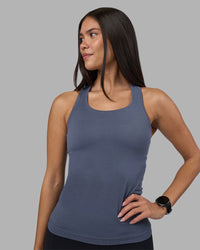Woman wearing AeroFLX+ Seamless Tank - Night Shadow/Night Shadow | Model:Rhiley | Size:S