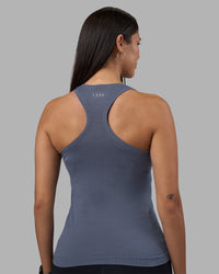 Woman wearing AeroFLX+ Seamless Tank - Night Shadow/Night Shadow | Model:Rhiley | Size:S