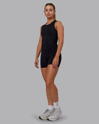 Woman wearing Base Tank - Black | Size:S | Model:Hannah