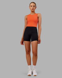 Woman wearing Base Tank - Ultra Orange | Model:Ella | Size:S