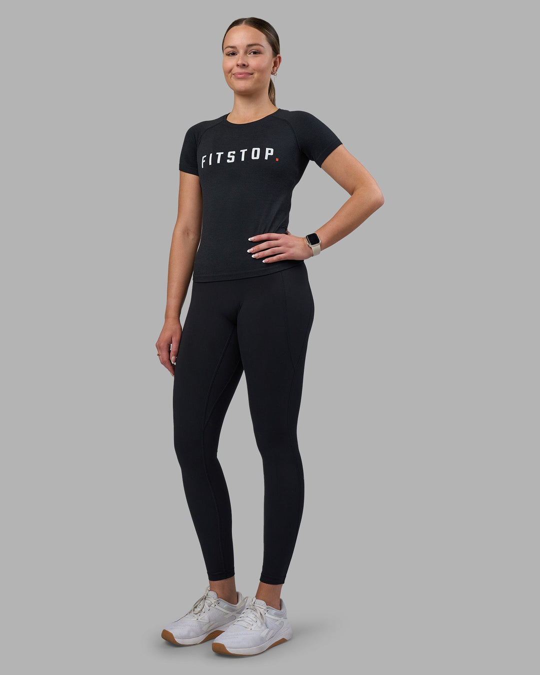 Woman wearing Fitstop AeroFLX+ Seamless Tee - Black | Model:Jade | Size:S