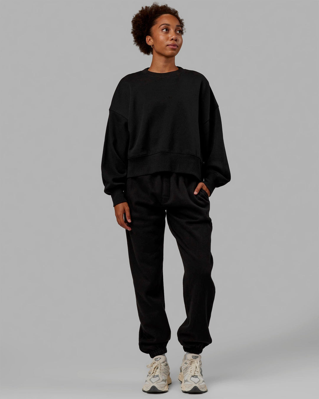 Woman wearing MVP Oversized Sweater - Black