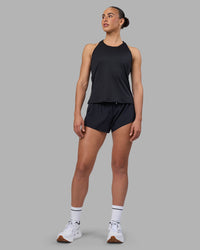 Woman wearing Pace Running Tank 2.0 - Black | Model:Sophie | Size:S