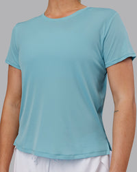 Woman wearing Pace Running Tee - Retro Blue | Model:Hannah | Size:S