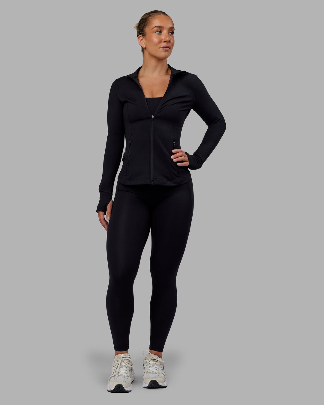 Woman wearing Stride Zip Through Jacket in Black | Size:S