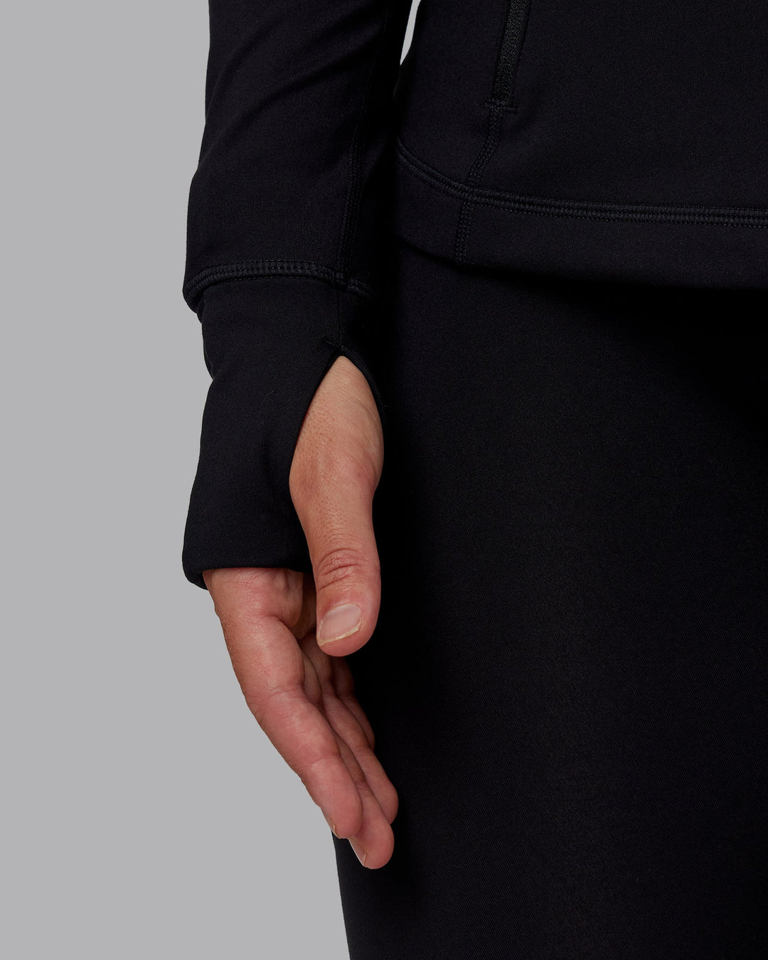 Woman wearing Stride Zip Through Jacket in Black | Size:S