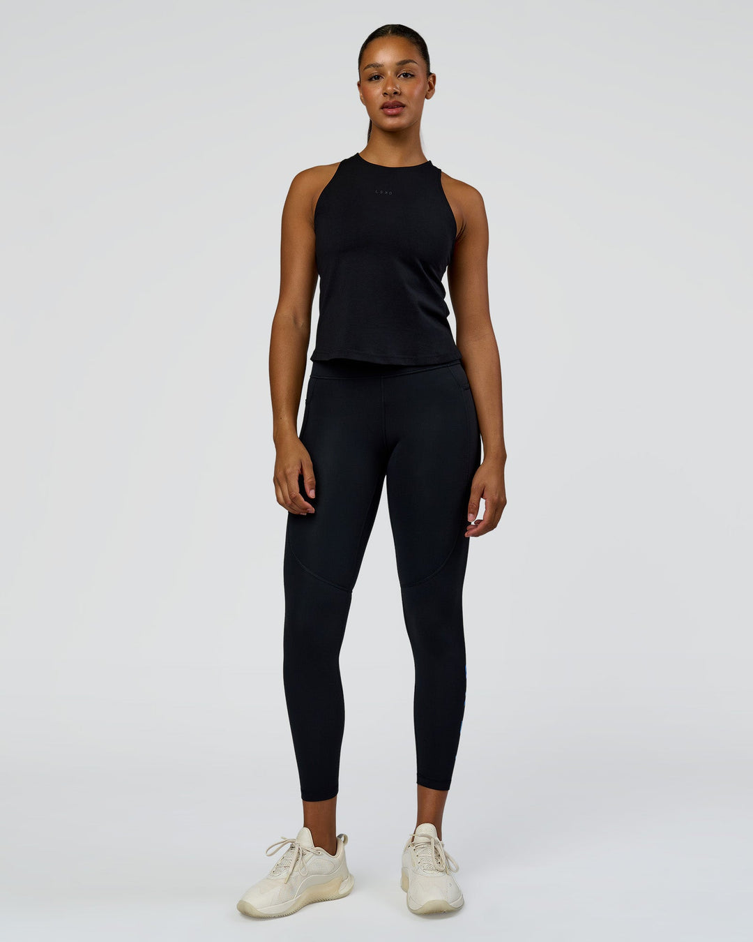 Woman wearing Wrap It Up FLXCotton Tank - Black | Model:Rosie | Size:S