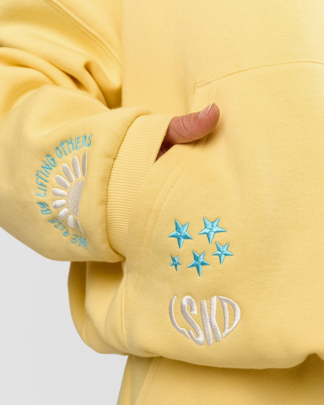 Woman wearing Zola Oversized Hoodie - Lemon | Model:Issy | Size:S