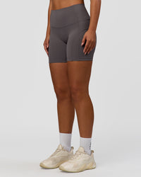 Woman wearing Bend High-Rise 6" Short - Duskstone | Model:Sophie | Size:S