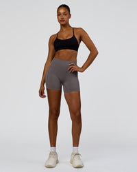 Woman wearing Infinite Contour Sports Bra - Black | Model:Rosie | Size:S
