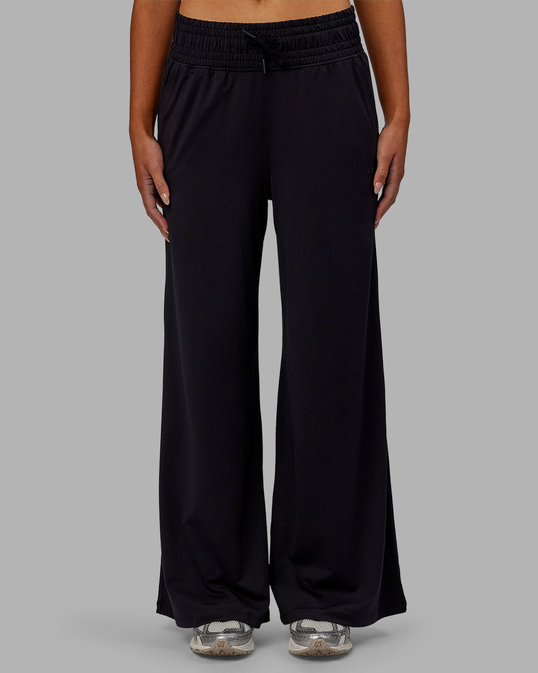 Woman wearing Restore CloudFLX Wide Leg Pants - Black