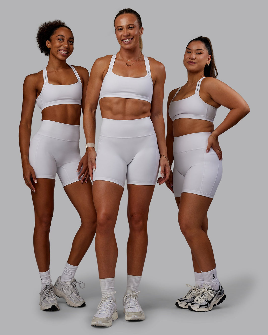 Woman wearing Bree Masters Velocity Sports Bra - White