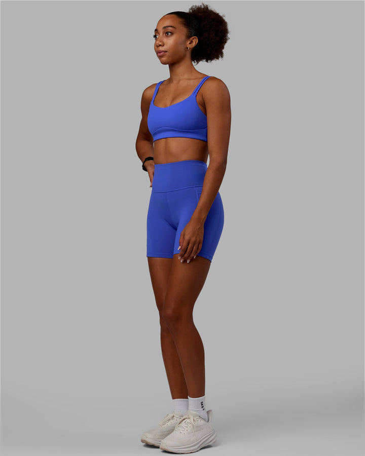 Woman wearing Vogue Sports Bra - Power Cobalt