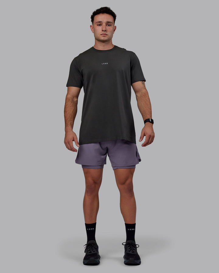 Man wearing Challenger 6&quot; Lined Performance Shorts - Purple Sage
