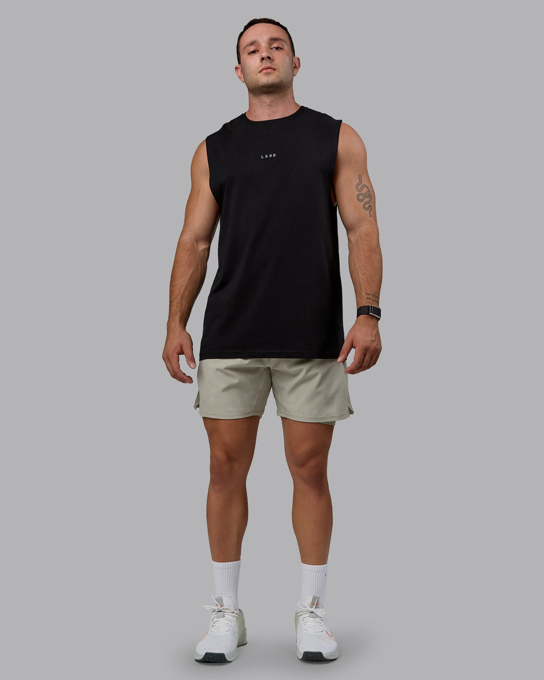 Man wearing Challenger 6&quot; Lined Performance Shorts - Sustained Grey