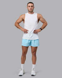 Man wearing Classic 5" Shorts - Crystal Blue