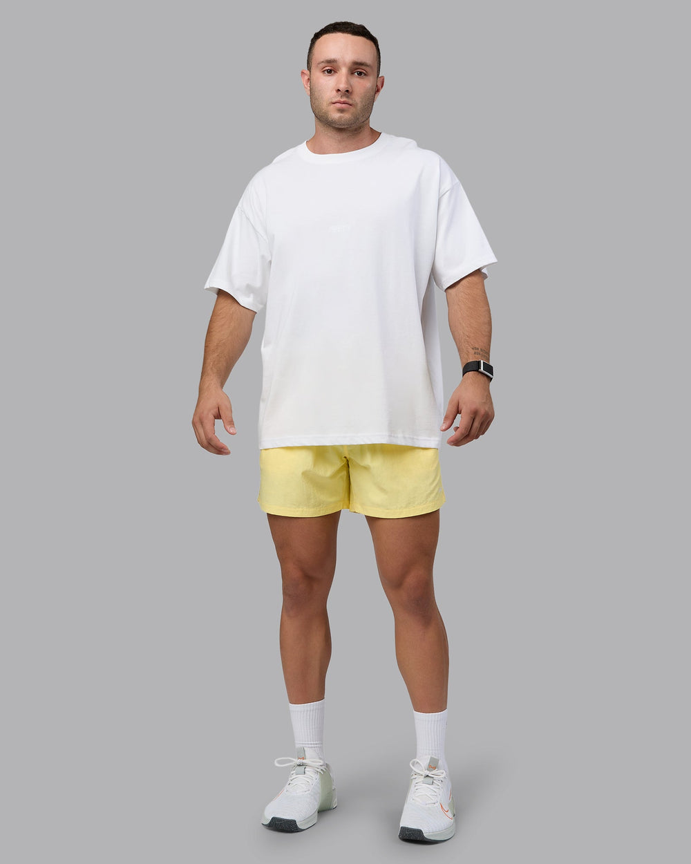 Man wearing Classic 5" Shorts - Lemon