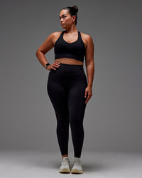 Woman wearing Fusion Ultra High-Rise Full Length Legging Pockets - Black | Model:Aimee | Size:XL