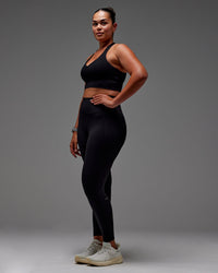 Woman wearing Fusion Ultra High-Rise Full Length Legging Pockets - Black | Model:Aimee | Size:XL