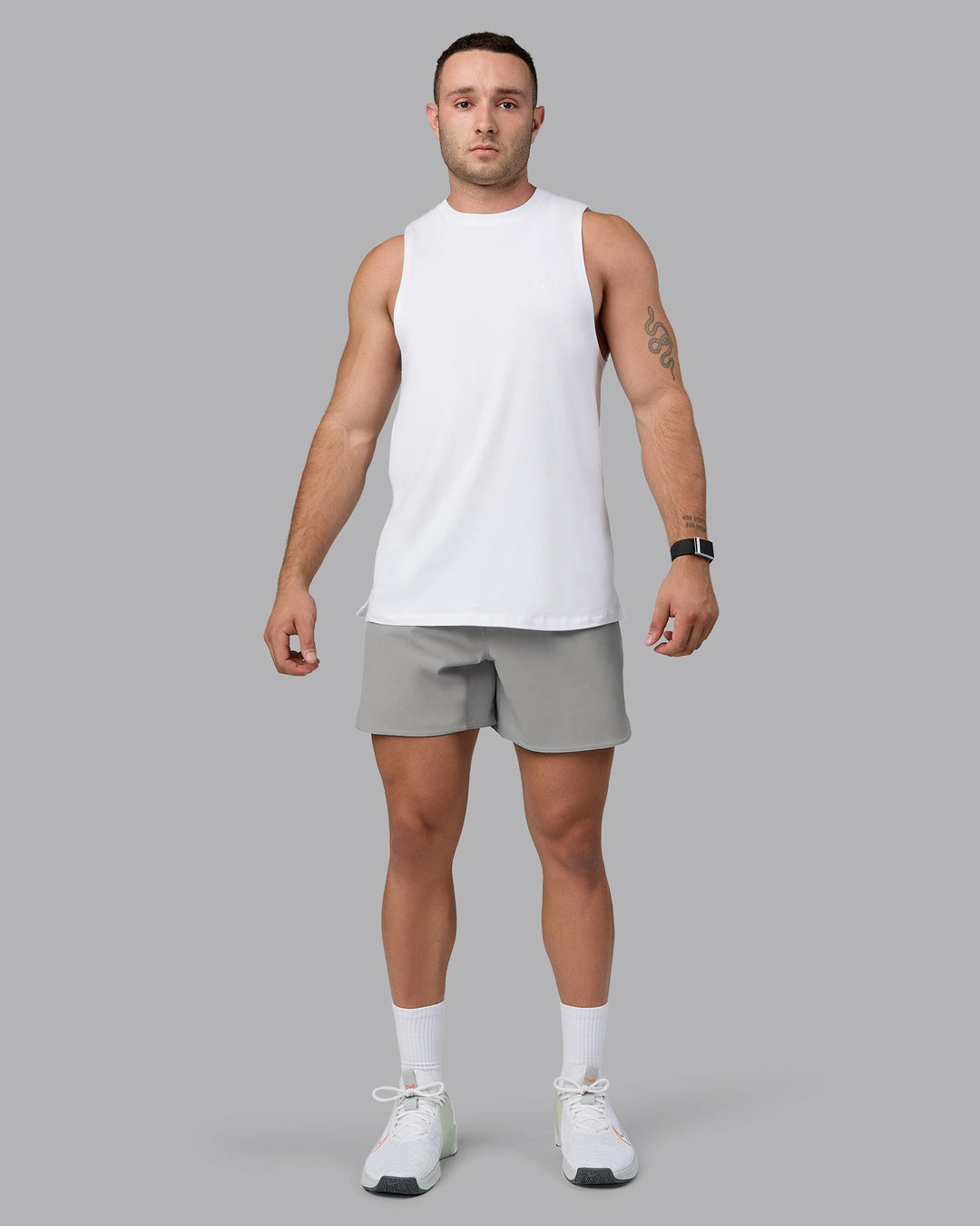 Man wearing Lift 6&quot; Performance Shorts - Circular Grey