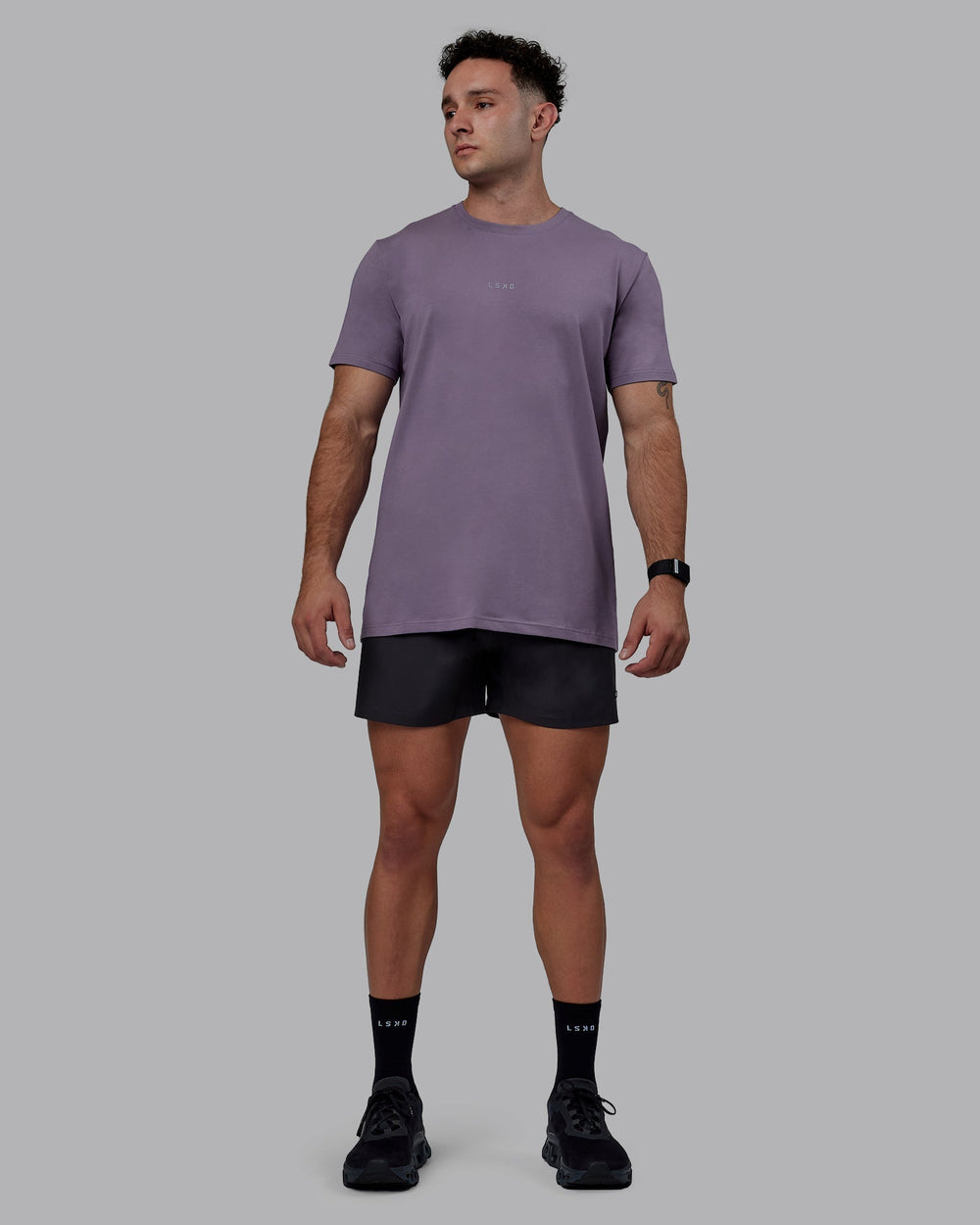 Man wearing Rep 5" Lined Performance Shorts - Pirate Black