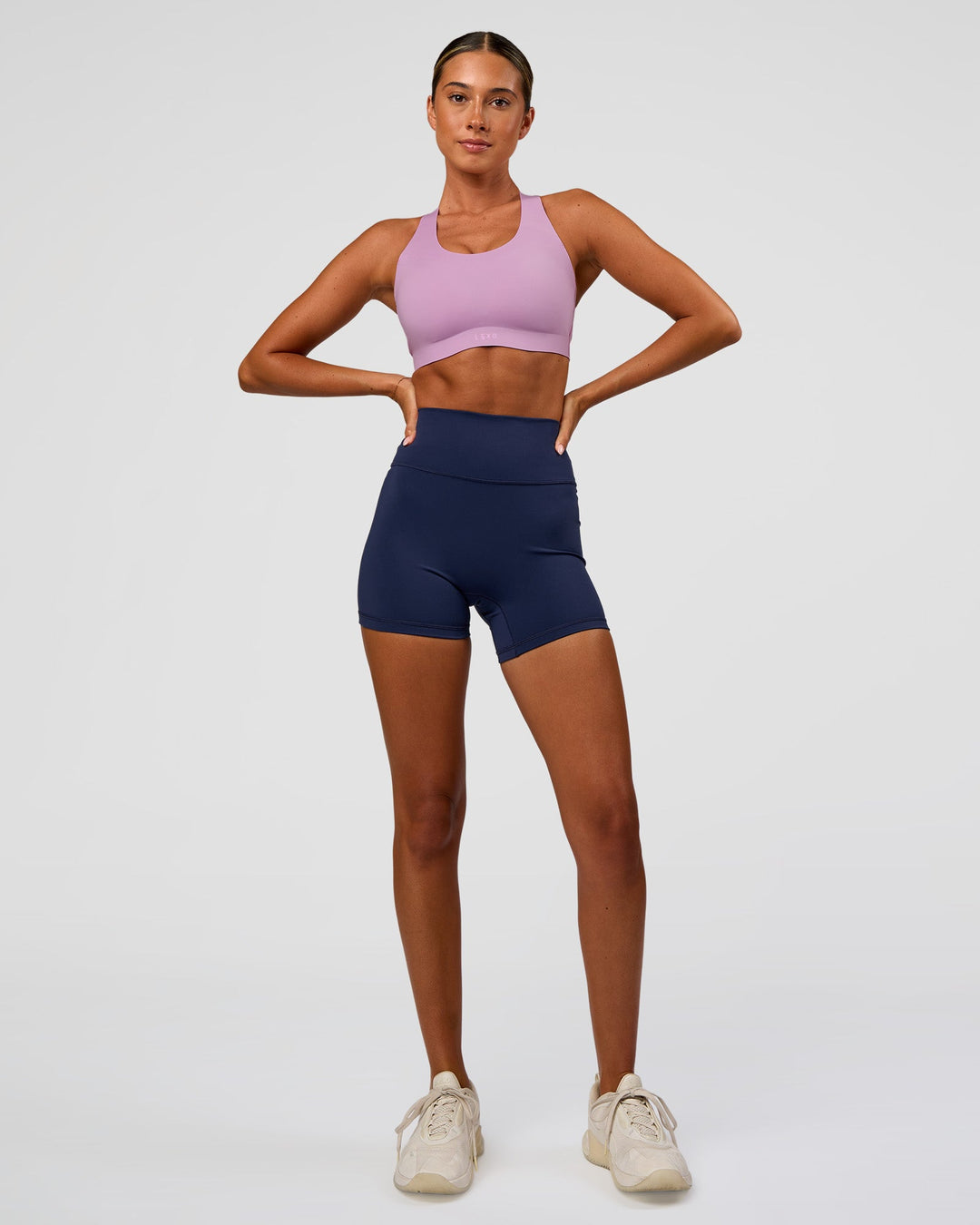 Woman wearing Stability High Support Sports Bra - Light Violet | Model:Charli | Size:XS (A-C Cup) - view 4